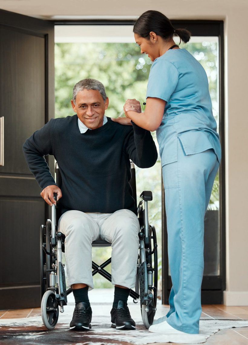 Up on those feet. Shot of a young nurse caring for an older man in a wheelchair